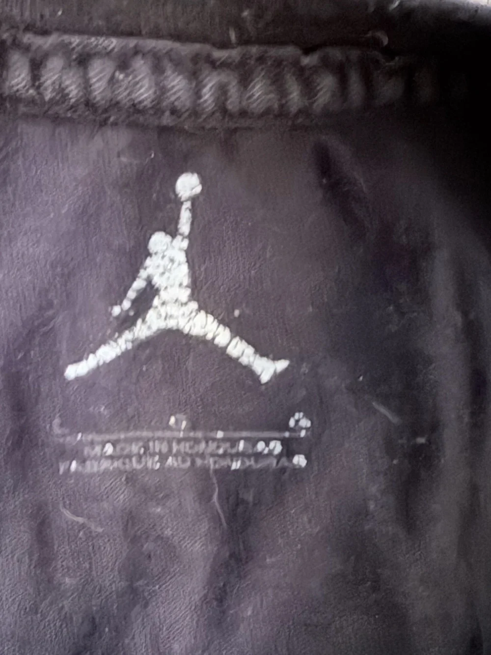 Jordan Black Tee with Multicolor Overlapping Circle Logo